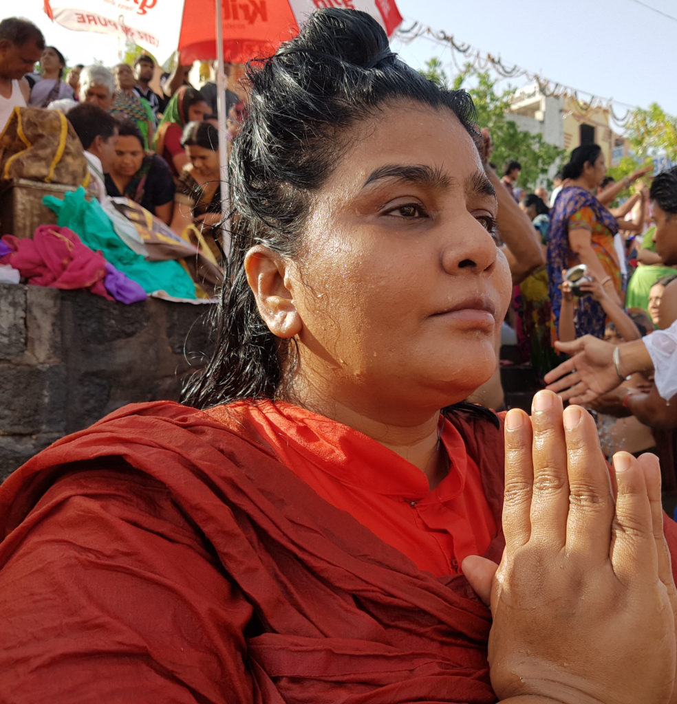 Sri Swamiji taking the holy dip in the Kshipra River